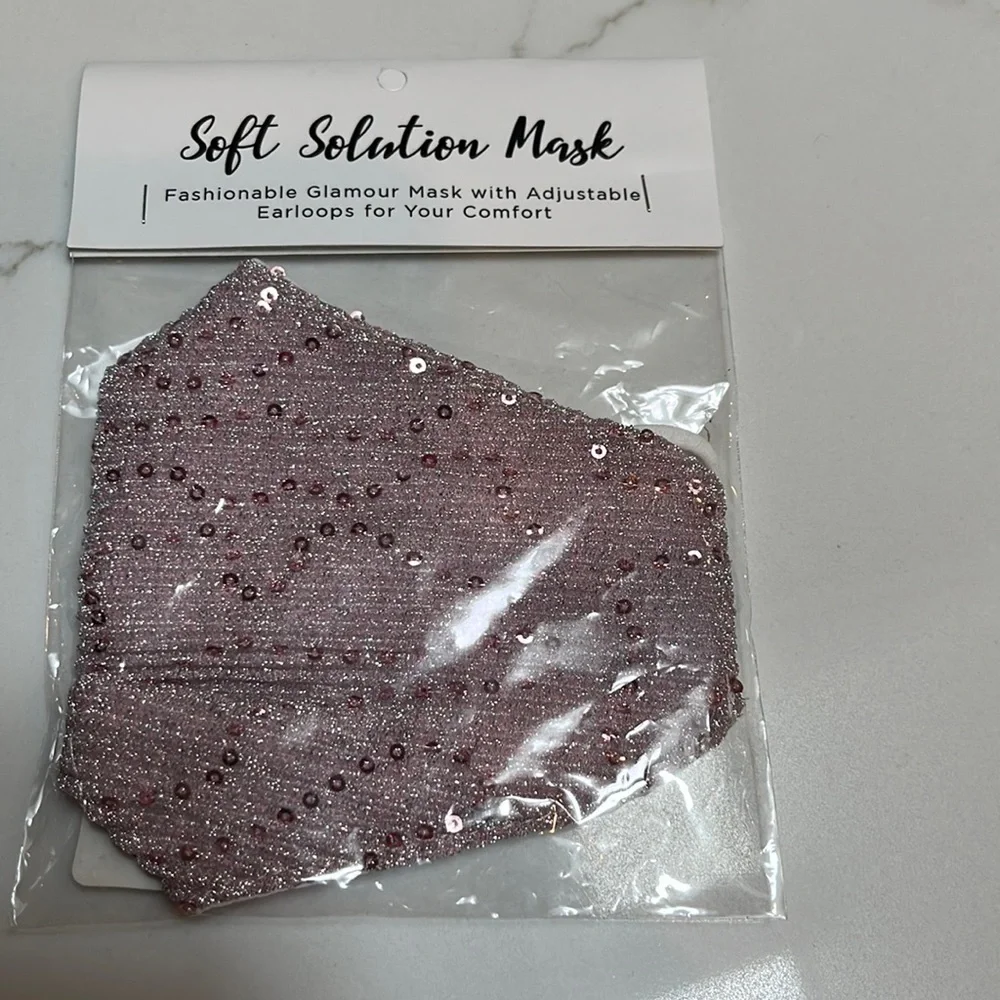 NWT sequin face mask, lilac color, still in original package - never opened.